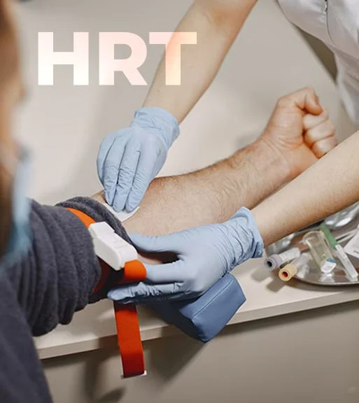 A patient having blood drawn at a lab